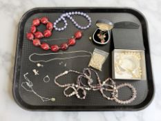 A silver herringbone link necklace, hardstone pendant on chain, two charms, dress ring,