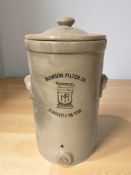 A Mawson stoneware water filter, height 52 cm.