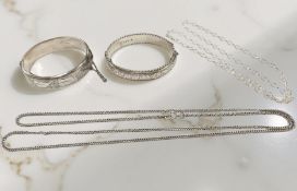 Two silver bangles and two chains CONDITION REPORT: 70g gross