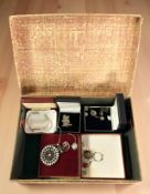 A group of silver and white metal jewellery including a mother of pearl and cabochon amethyst disk