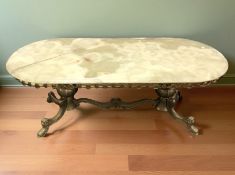 A brass and onyx oval coffee table,