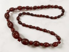 A graduated cherry Bakelite necklace