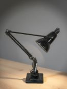 A 20th century enameled metal angle poised lamp.