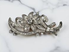A platinum diamond floral spray brooch, approximately 2.