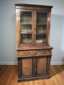 A Victorian walnut double door bookcase, 105 cm x 51 cm x 222 cm.