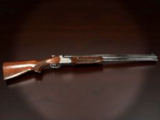 An Aya 12 bore shotgun, over under , 101638, multi choke 28'' barrels with single trigger,