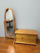A modern pine blanket box, width 92 cm, and a cheval mirror.