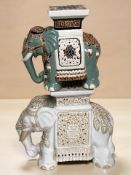 Two ceramic elephant plant stands, tallest 33 cm.