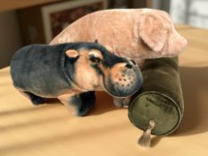 A pig soft toy, length 68 cm, further hippo and a bolster cushion.