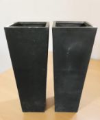 A very large pair of fibreglass planters, height 120 cm.