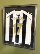 A signed Newcastle United Scott Parker football shirt, in frame, overall 80 cm x 65 cm.