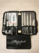 A set of Meisterbach chef's knives, in carry bag.