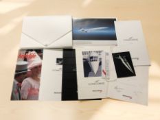 A group of Concorde ephemera in folder, including flight certificate, menu and other brochures.