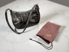 A Mulberry Black Leather Bag, with adjustable strap, 21cm wide, with Burgundy dust cover.