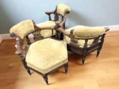 An early 20th century mahogany three seater conversation settee,