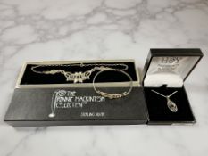 A Charles Rennie Mackintosh silver necklace, boxed, together with a further bangle and a pendant.
