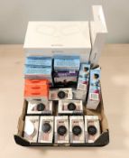 A quantity of new smart watches, sport arm bands, Sixpad body trainers, etc.