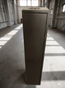 A gun cabinet with keys, height 128 cm.