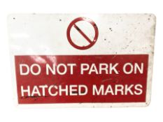 A fibreglass 'No Parking' sign, 40 cm x 60 cm.