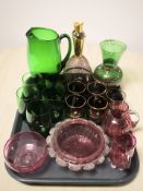 A group of Cranberry glass bowls and jugs,