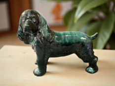 A large Canadian Blue Mountain pottery figure of a Spaniel,