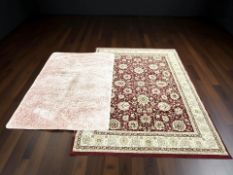 A machine made rug of Persian design, 230 cm x 170 cm,