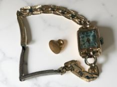 A vintage lady's 9ct gold cased wristwatch on plated strap together with a gold stud