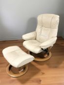 A Norwegian Ekornes Stressless swivel armchair and matching stool