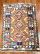 A Chobi Kilim rug, 120 cm x 84 cm.