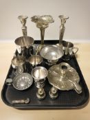 EPNS items including candlesticks, chamber sticks, mugs,