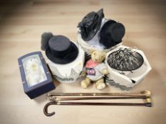 A group of lady's summer hats, three walking sticks,