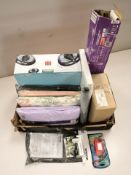 A group of homewares including bed covers, garden lights,