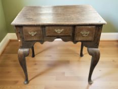 A George III oak low boy,