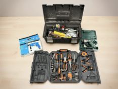 A tool box and contents, hammer drill,