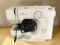 A Janome Major IV electric sewing machine with lead and pedal (Continental plug)