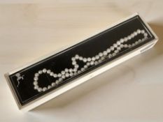 A silver and fresh water cultured pearl necklace,