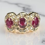 An 18ct gold ruby and diamond ring, size M CONDITION REPORT: 3.