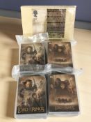 Four Topps The Lord of the Rings trading card packs and further pack of postcards