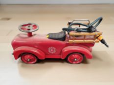 A child's ride on fire engine,