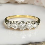 An antique 18ct gold five stone diamond ring, size N CONDITION REPORT: 2.