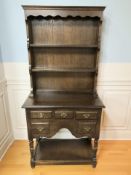 A reproduction oak dresser,