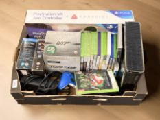An Xbox 360 console with controllers, various games, PS4 AIM controller, Harry Potter blu-rays etc.