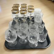 A set of eight Italian crystal wine glasses with gilt Greek key rim,