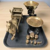 A brass model of a horse and cart, cast iron and brass pan scales,