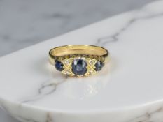 An antique 18ct gold sapphire and diamond ring, size P CONDITION REPORT: 2.