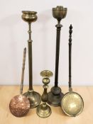 Two brass smoker's stands,