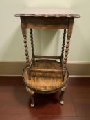 An oak barleytwist occasional table and walnut low table
