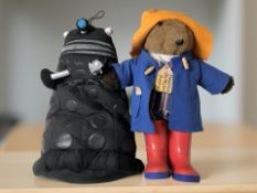 A Paddington bear and Dalek toy (1 box)