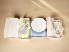 A Wedgwood china bowl commemorating Ridley Quiney & Co Ltd, together with two boxed Nao figurines.