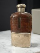 A silver, glass and crocodile leather-mounted hip flask, London 1911, height 15cm.